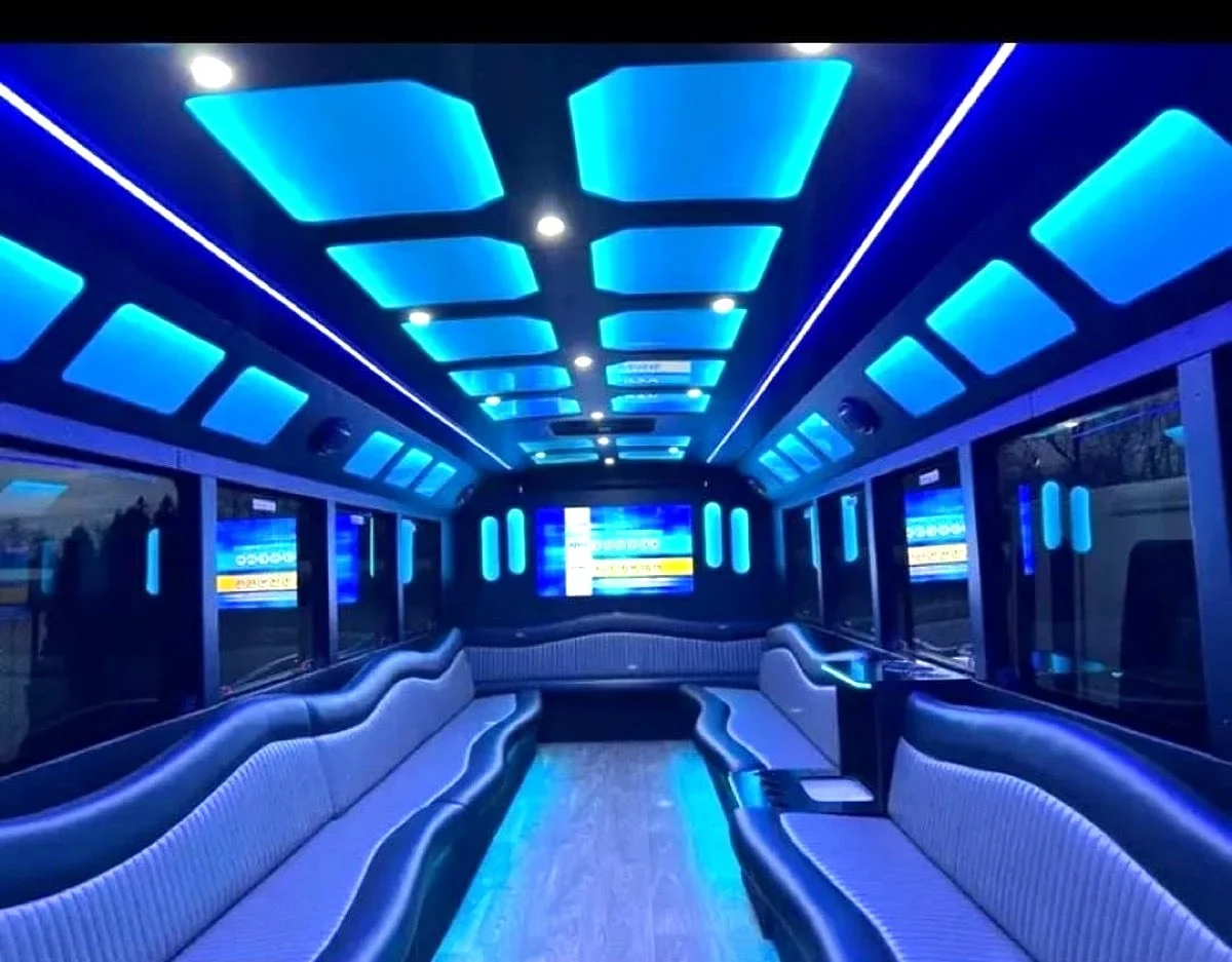 Party bus interior with blue ceiling panels